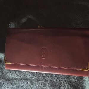 Cartier Maroon Leather Clutch with Gold Accents